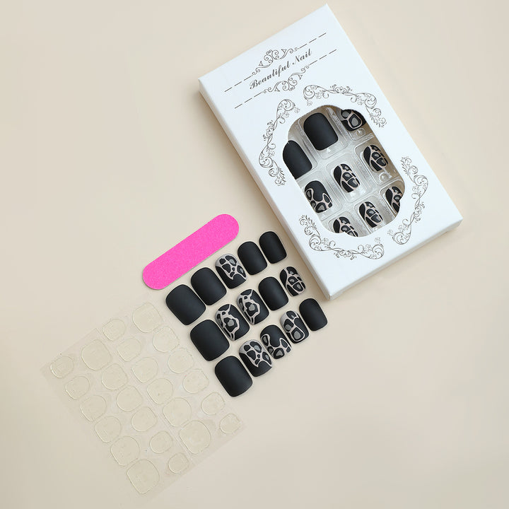 Artistic Press-On Nail Set with Elegant Design Elements Bowlift