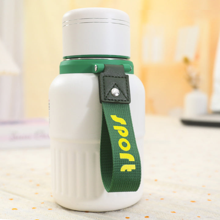 Insulated drinking bottle with integrated carrying strap Bowlift