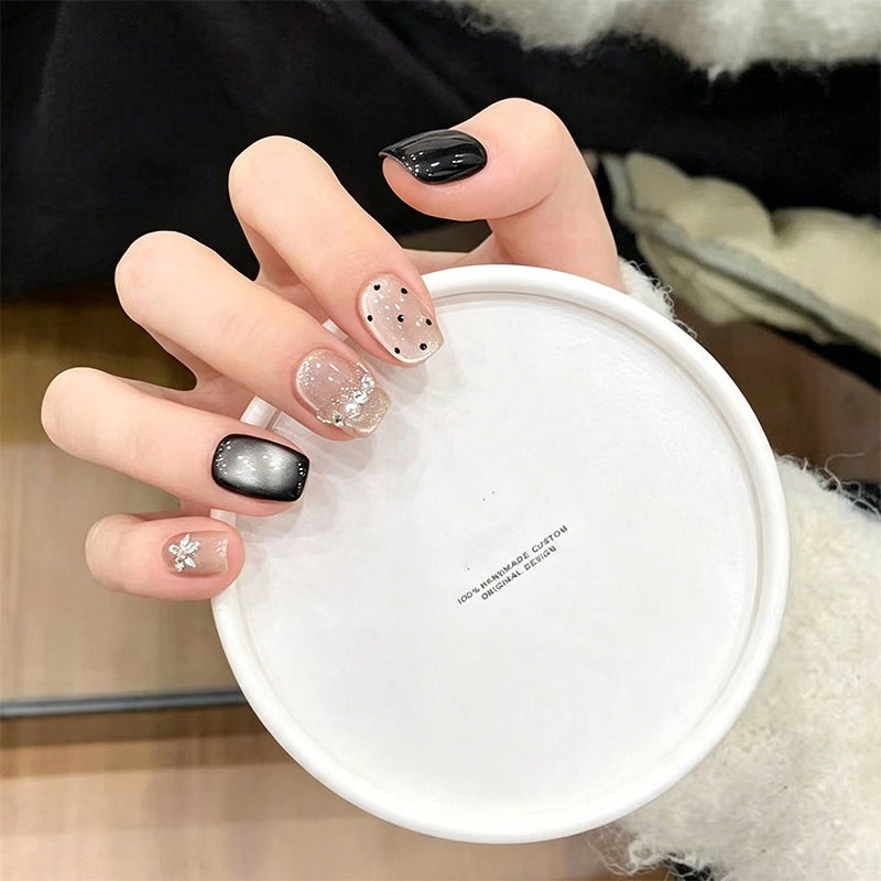 Acrylic nail set with glamorous accents and delicate designs Bowlift