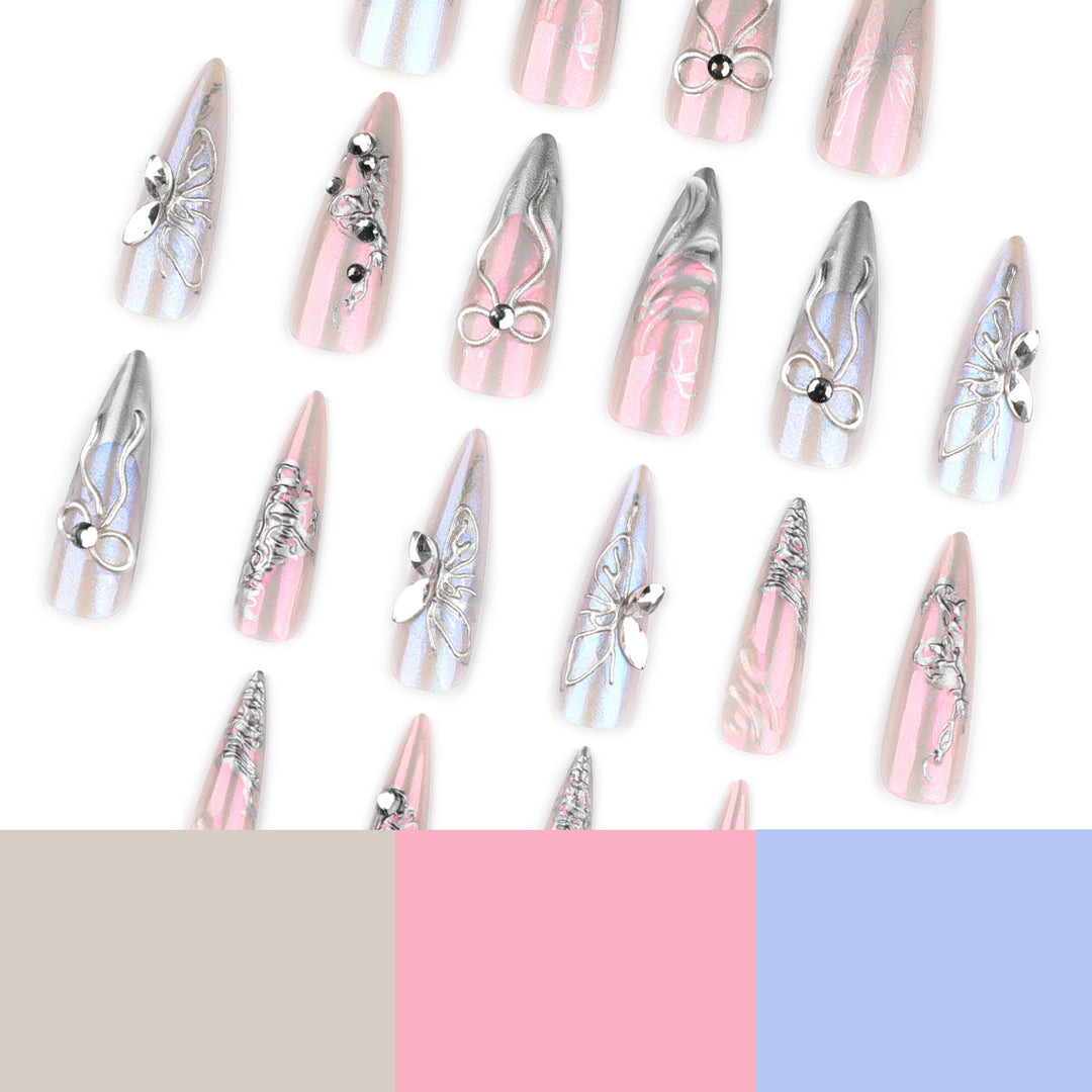 Artful stiletto nails with delicate silver casting decoration Bowlift