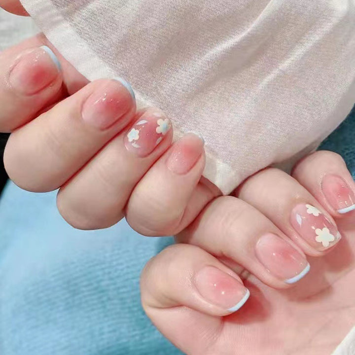 Artistic gel nails with delicate floral designs Bowlift