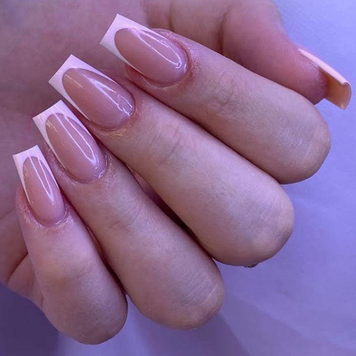 Acrylic nail set with elegant French tips and nourishing accessories Bowlift