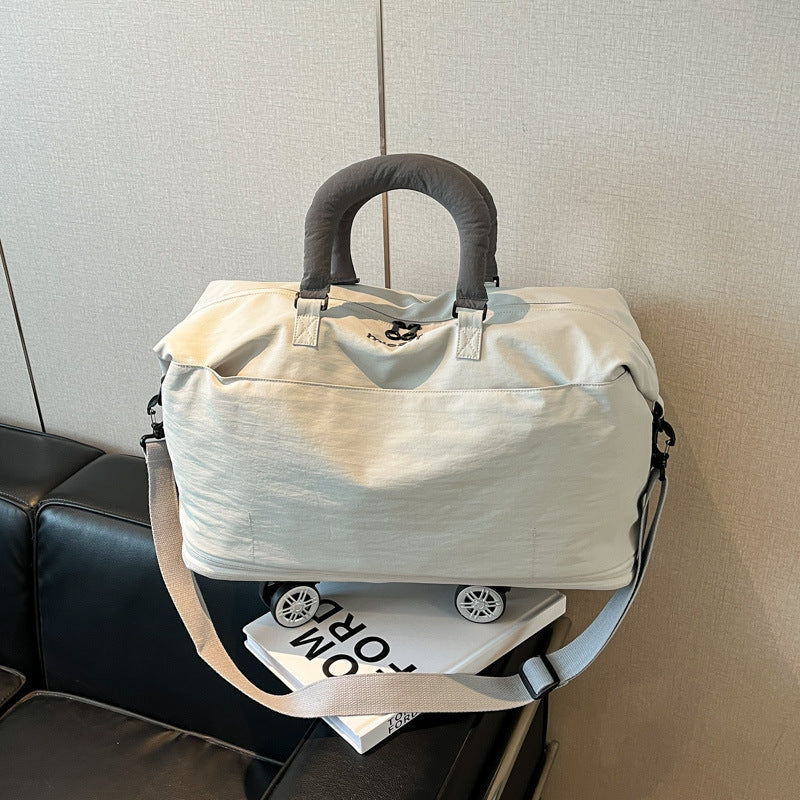 Sporty tote bag with multiple compartments Bowlift