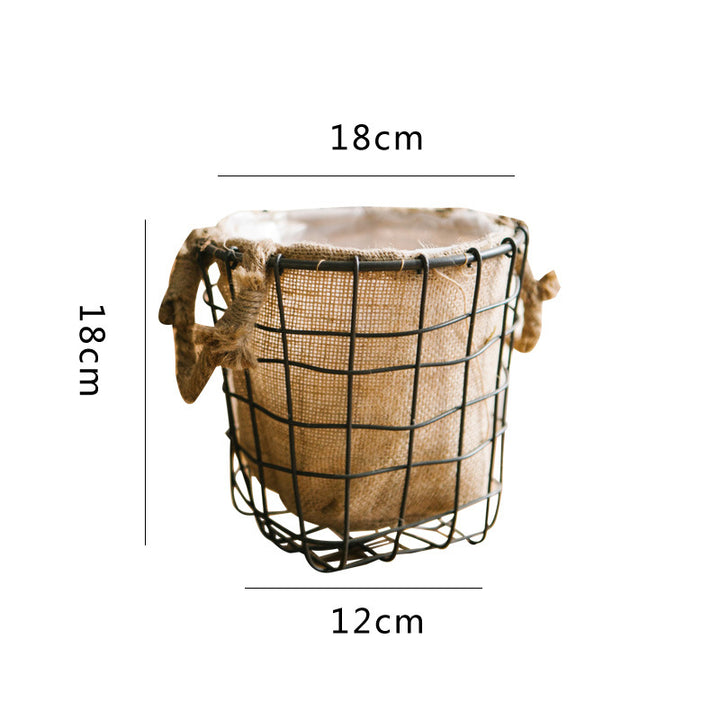 Decorative storage basket made of wire and linen Bowlift