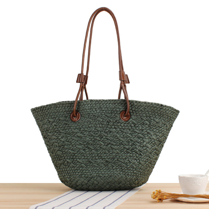 Beach bag made of high-quality braided straw with stylish leather handles Bowlift