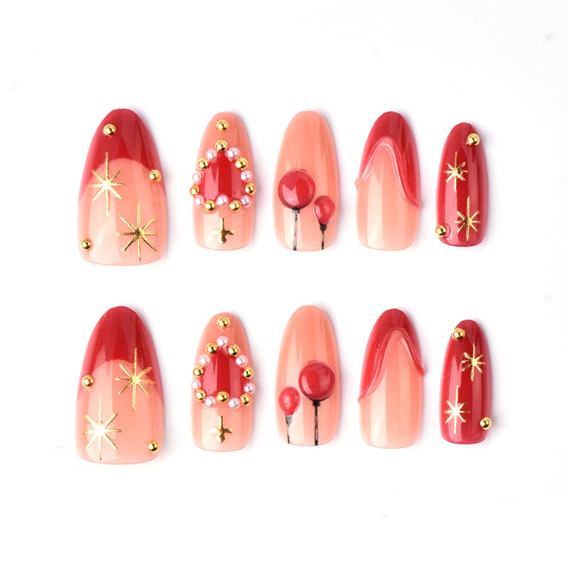 Elegant artificial nails with romantic gold and pearl embellishments Bowlift