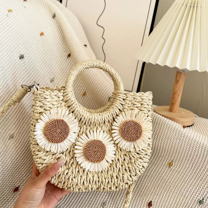 Handbag made of natural material with floral accents Bowlift