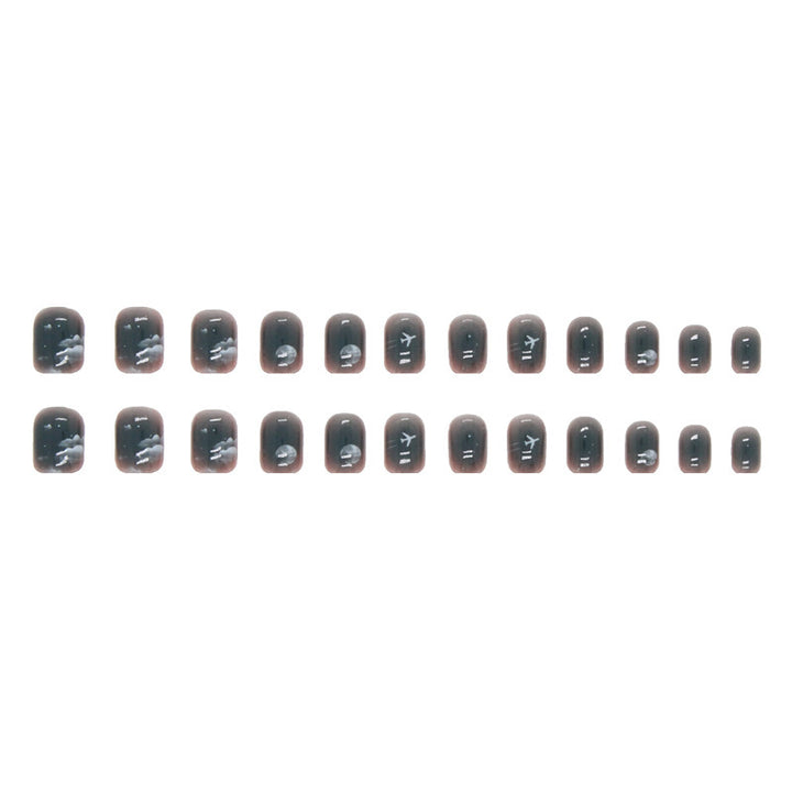 Artistic Travel-Themed Nail Extensions Bowlift
