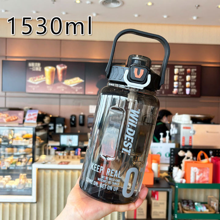 Women’s large water bottle with integrated straw and carrying handle Bowlift