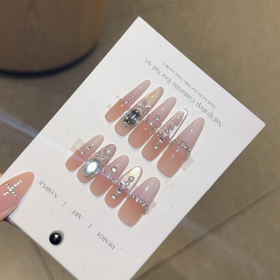 Artificial nails with elegant crystal decorations Bowlift