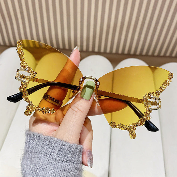 Women's extravagant sunglasses with sparkling butterfly design Bowlift