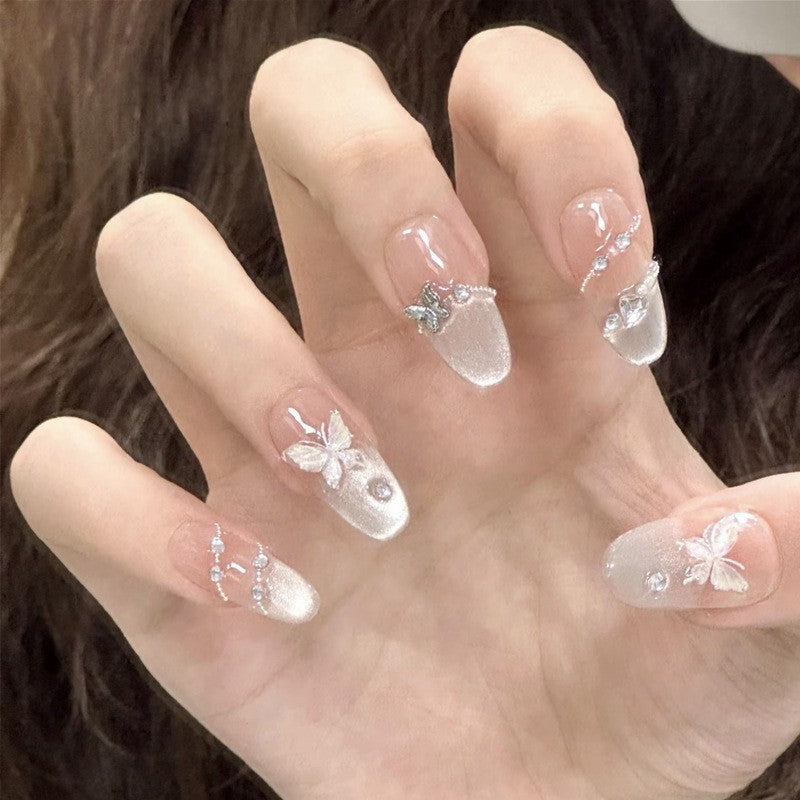 Artificial nail set with elegant tips and crystal accents Bowlift