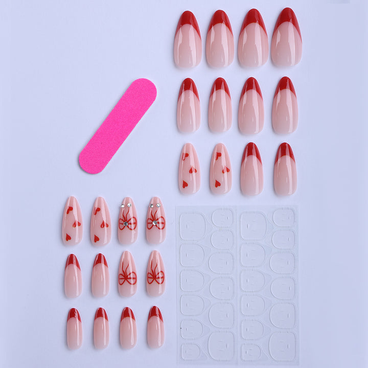 Artificial nails with elegant heart designs and glamorous accents Bowlift