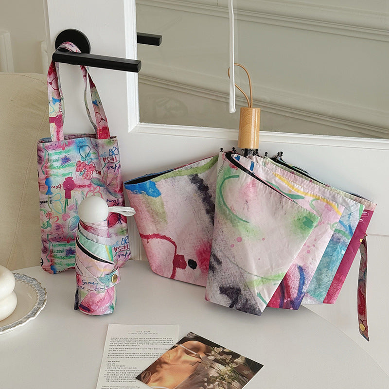 Women’s Foldable Tote Bag with Integrated Umbrella Bowlift