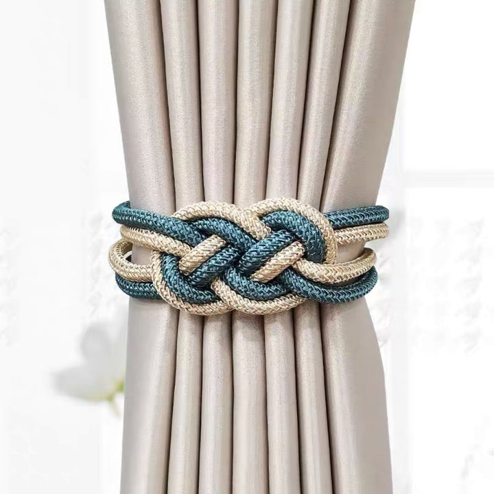 Decorative curtain tieback with braided design Bowlift
