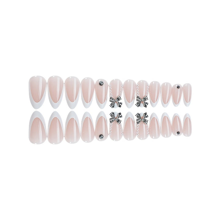 Acrylic nail set with elegant decorative embellishments Bowlift