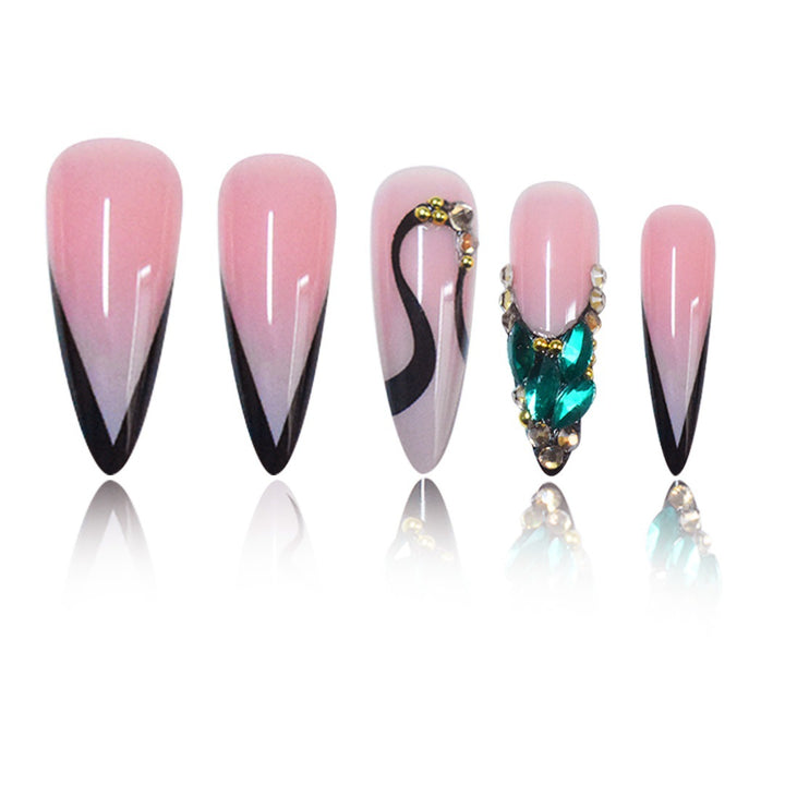 Artistic Stiletto Press-On Nail Art with Gemstone Accents Bowlift