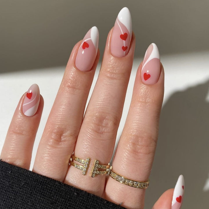 Heart-Embellished Stiletto Nail Art Bowlift