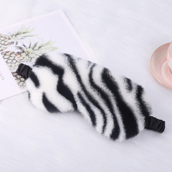 Women's luxury faux fur sleep mask with leopard print, extra soft padding and elastic comfort band Bowlift