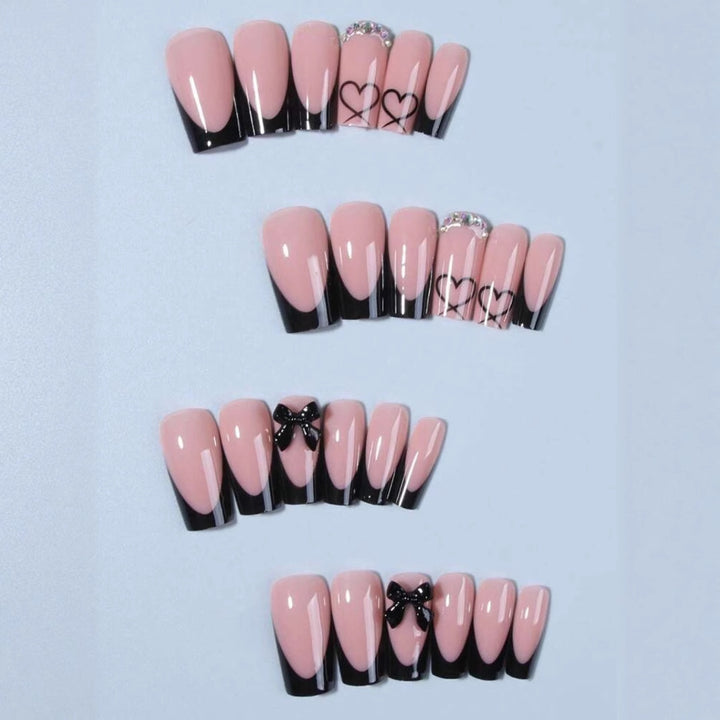 Acrylic nail set with elegant heart and bow design Bowlift