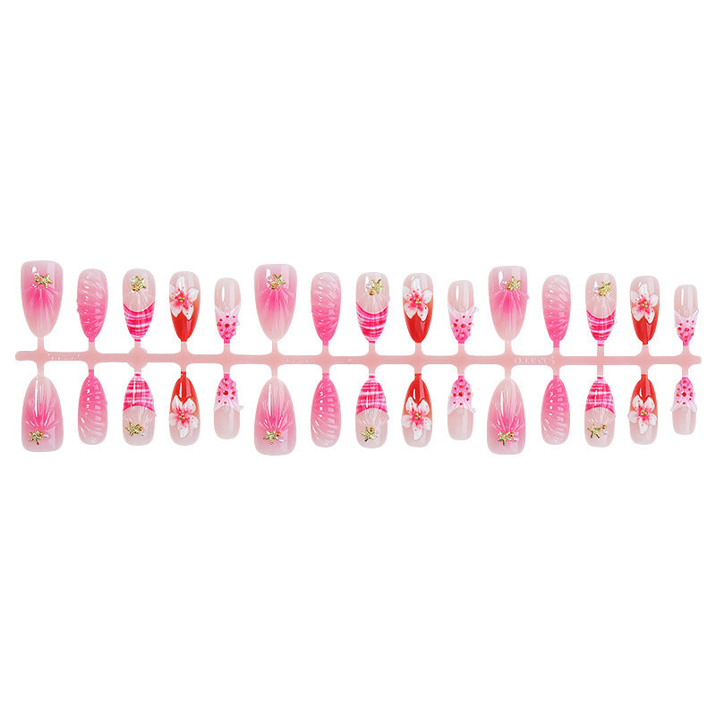 Acrylic nail set with luxurious glitter and flower accents Bowlift