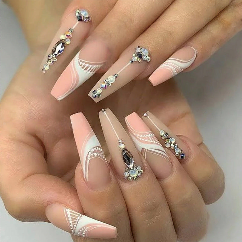 Artful nail extensions with elegant decorations Bowlift