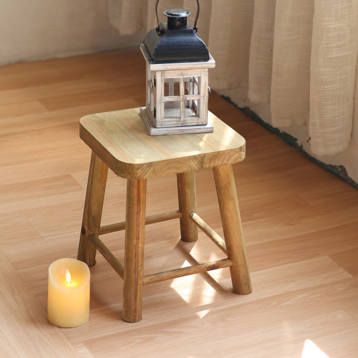 Robust stool made of solid wood Bowlift