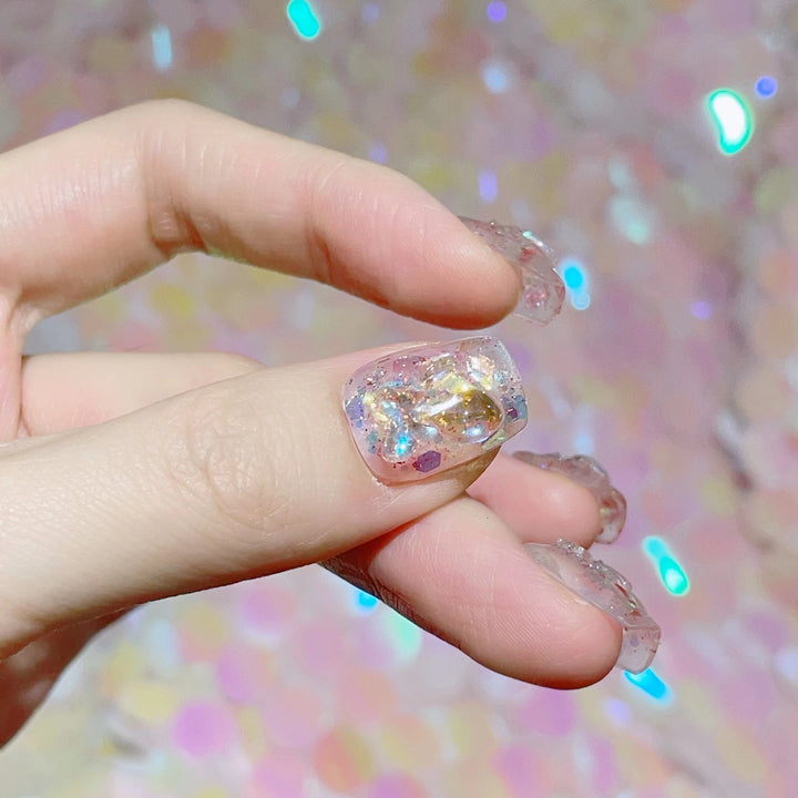 Artful nail tips with glitter accents Bowlift