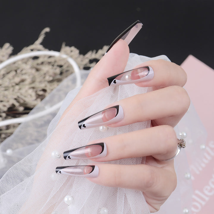 Elegant Stiletto Press-On Nails with Artistic Design Bowlift