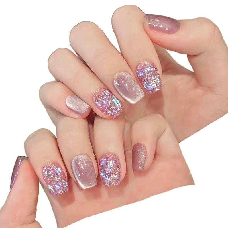 Acrylic nails with glitter accents and modern designs Bowlift