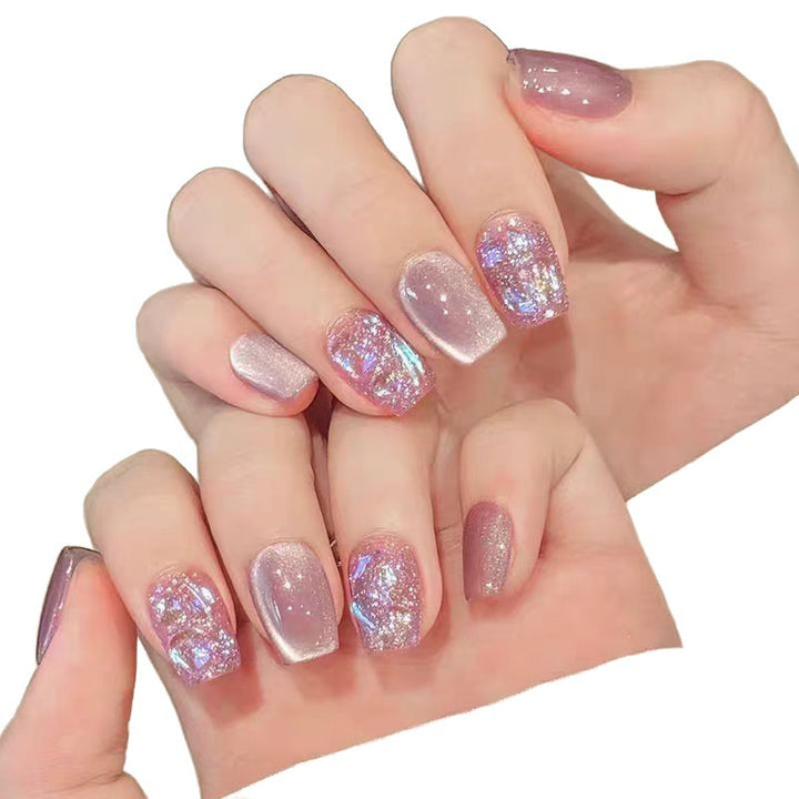 Acrylic nails with glitter accents and modern designs Bowlift