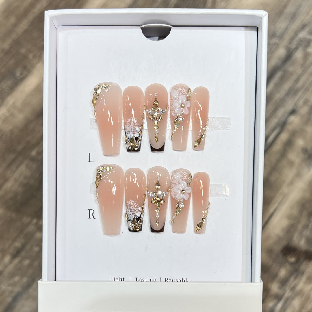 Elegant Stiletto Press-On Nail Set with Decorative Accents Bowlift