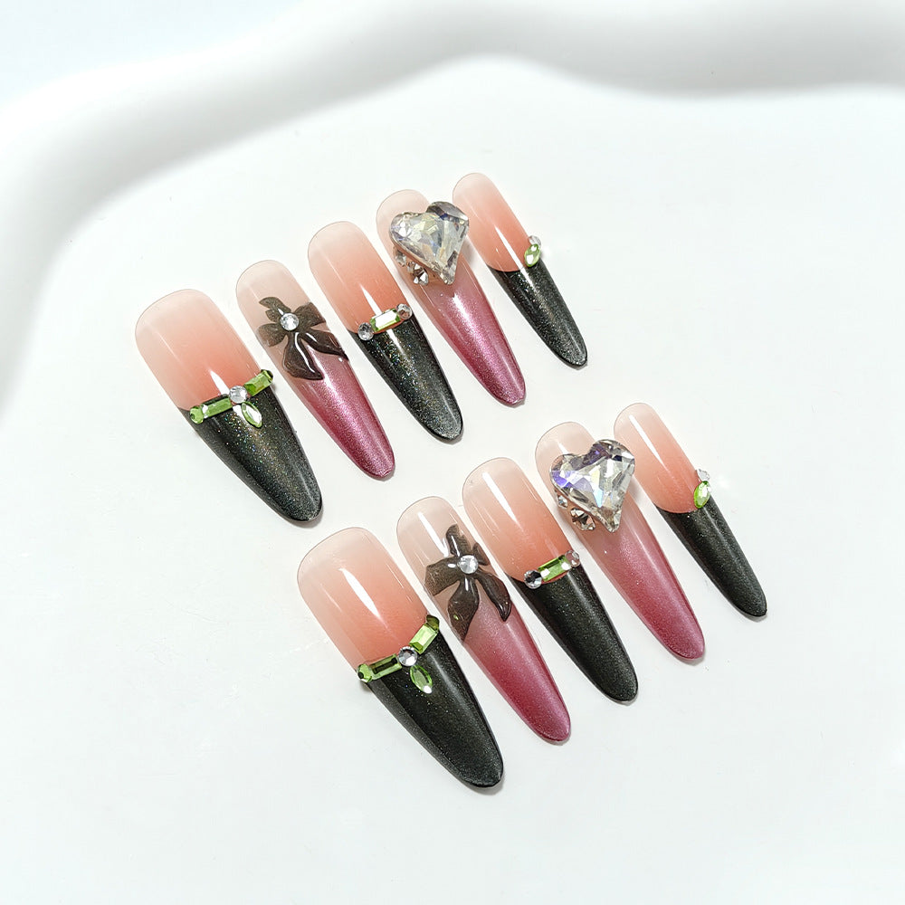 Artificial nails with elegant tip design and glitter accents Bowlift