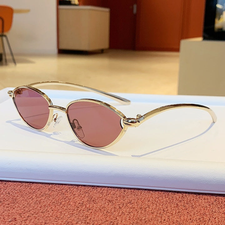 Women's designer sunglasses with elegant metal frame and protective lenses Bowlift
