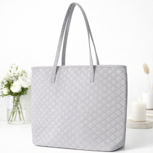 Fashionable handbag made of textured material Bowlift
