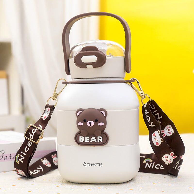 Women's insulated drinking bottle with practical carrying strap and cute bear motif Bowlift