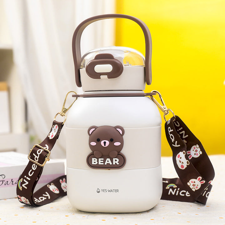 Women's insulated drinking bottle with practical carrying strap and cute bear motif Bowlift