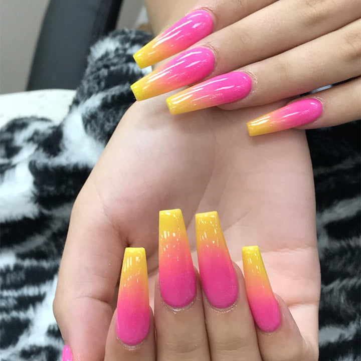 Artificial nail tips in modern ombre design Bowlift