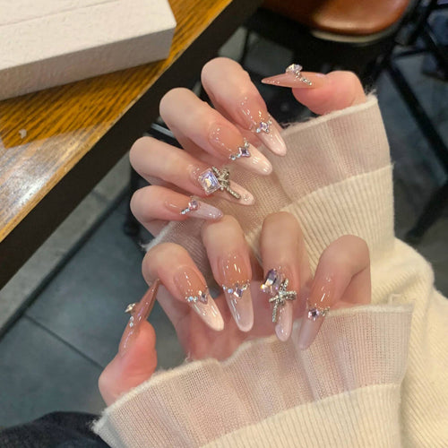 Artistic Nail Design with Decorative Elements Bowlift
