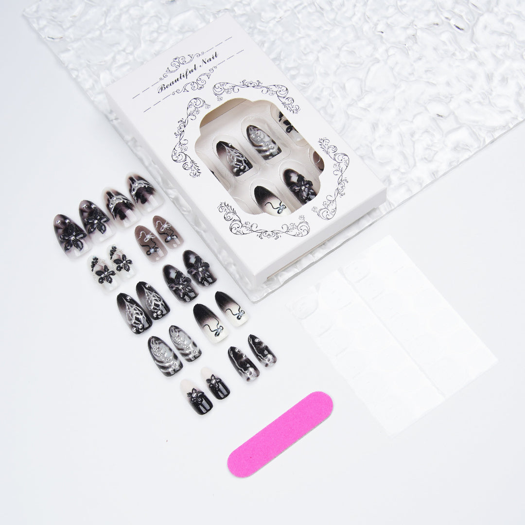 Elegant acrylic nail set with complex designs Bowlift
