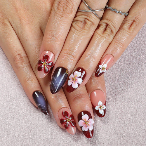 Acrylic nail set with floral accents and luxurious decorations Bowlift