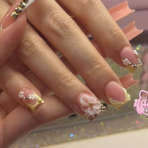 Nail art set with glamorous glitter and flower accents Bowlift