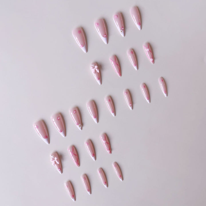 False nail set with playful 3D details and elegant accents Bowlift