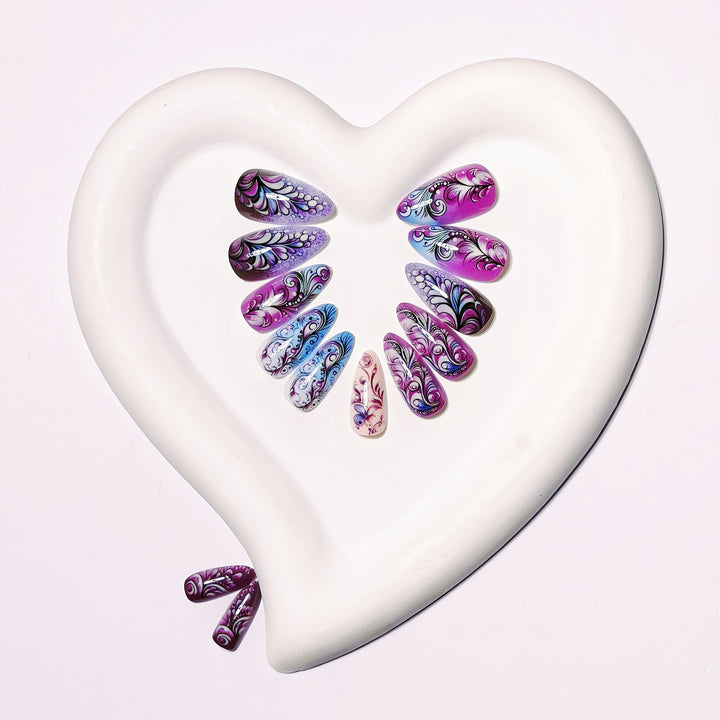 Creative artificial nails with floral and shimmering design elements Bowlift
