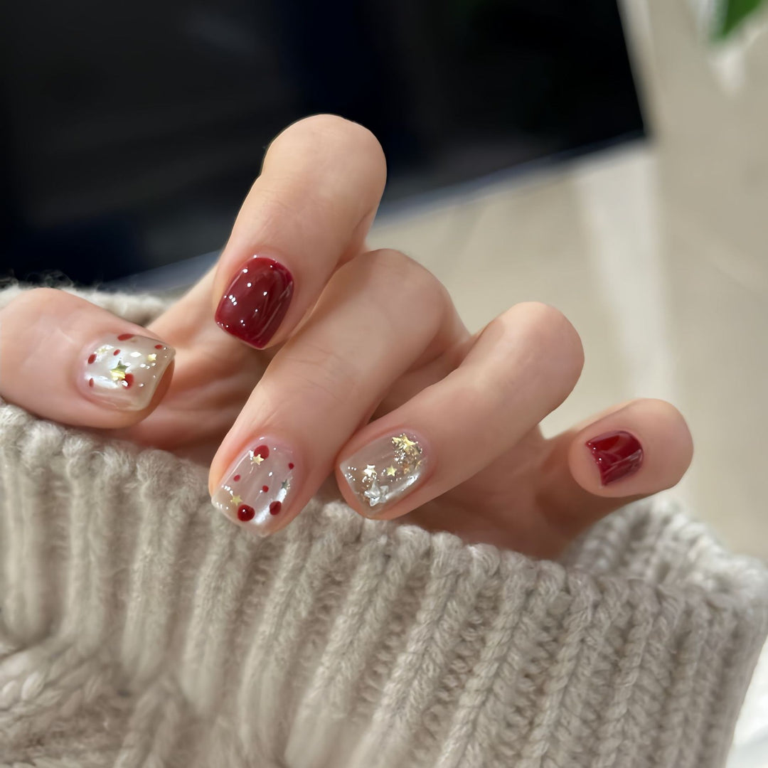 Nail set with sparkling glitter details and creative designs Bowlift