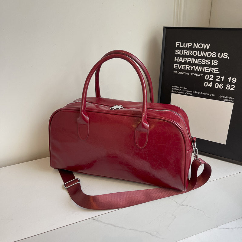 Elegant and Spacious Weekend Bag Made of High-Quality Synthetic Leather Bowlift