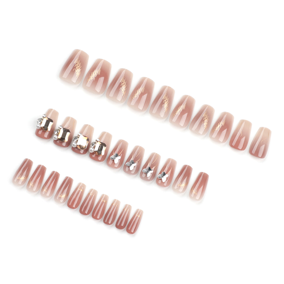 Artificial nail art with elegant jewelry accents Bowlift