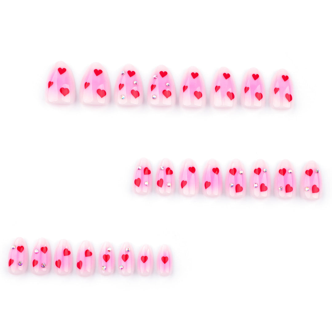 Artful nail art with heart motifs and glamorous details Bowlift