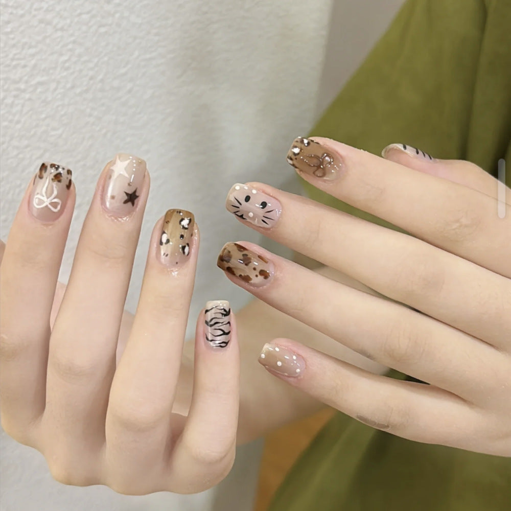Decorative Long Stiletto Press-On Nails with Heart and Floral Accents Bowlift