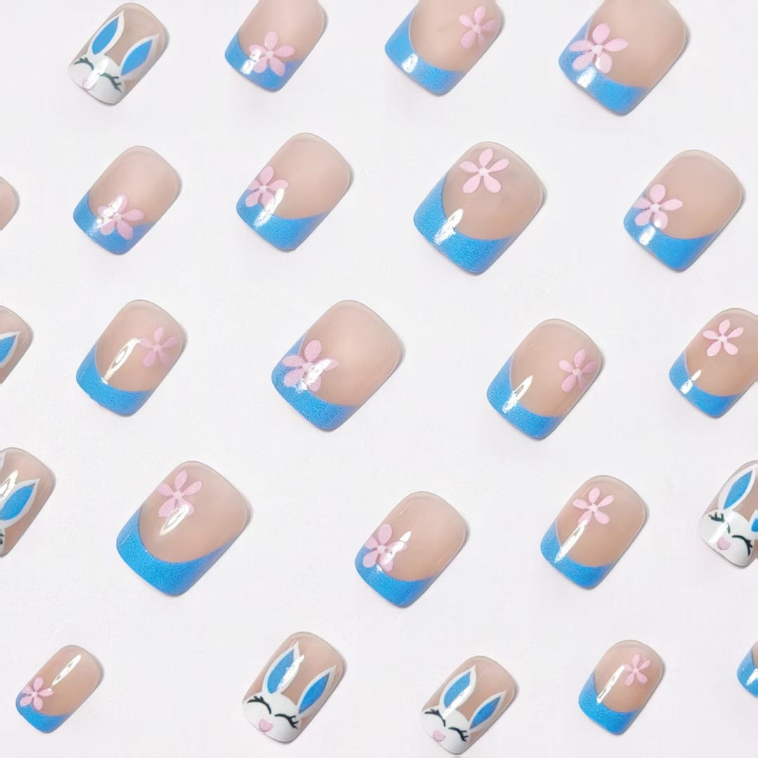Creative nail art with cheerful bunny and flower pattern Bowlift